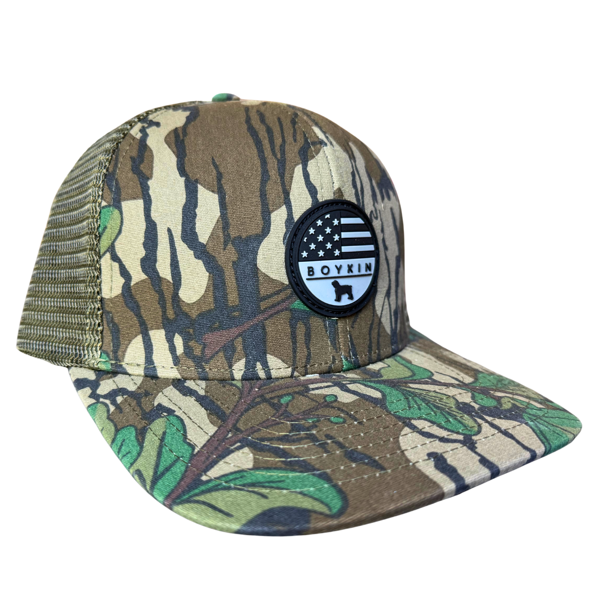 Mossy Oak Greenleaf camo trucker hat with patriotic Boykin Spaniel rubber patch